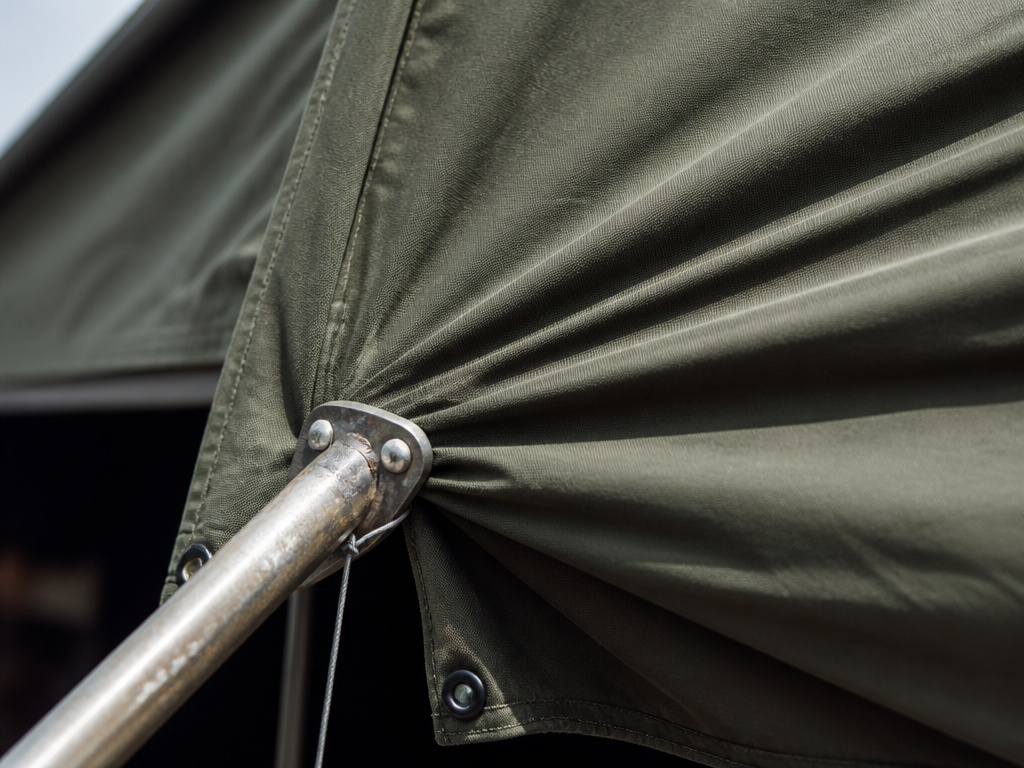 Close-up of realistic tent fabric wrinkles radiating from a pole anchor point.